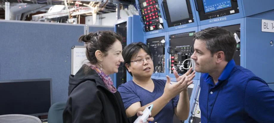 Angela Anderson interviews SLAC scientists.